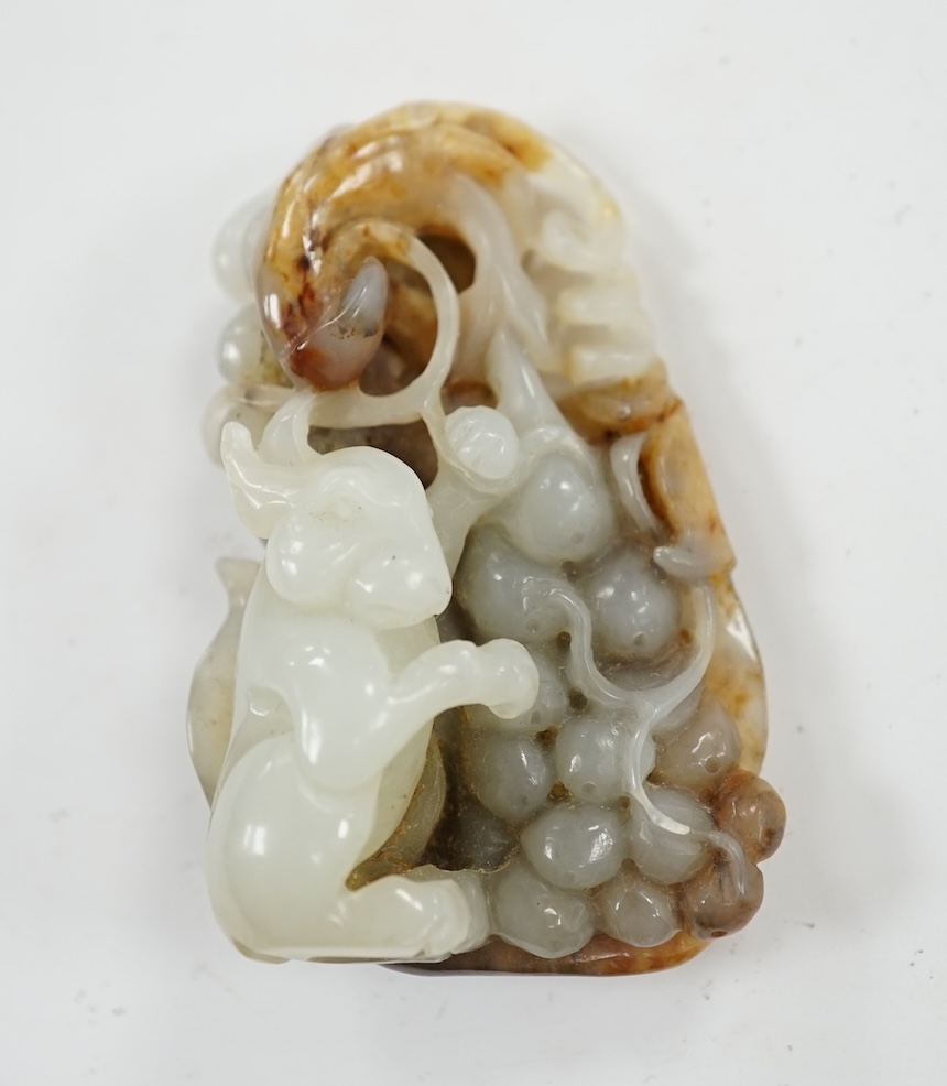 A Chinese russet jade carving of an animal, 6cm high. Condition - good